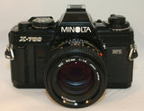 Minolta X-700, Ultimate Outfit, 50mm 1.4 Lens, Power Grip 2, MD1, 360PX, Cables —Student —Used